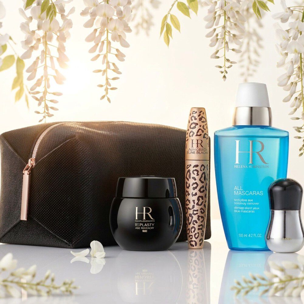 Helena Rubinstein Produkte unter weißem Blauregen.​